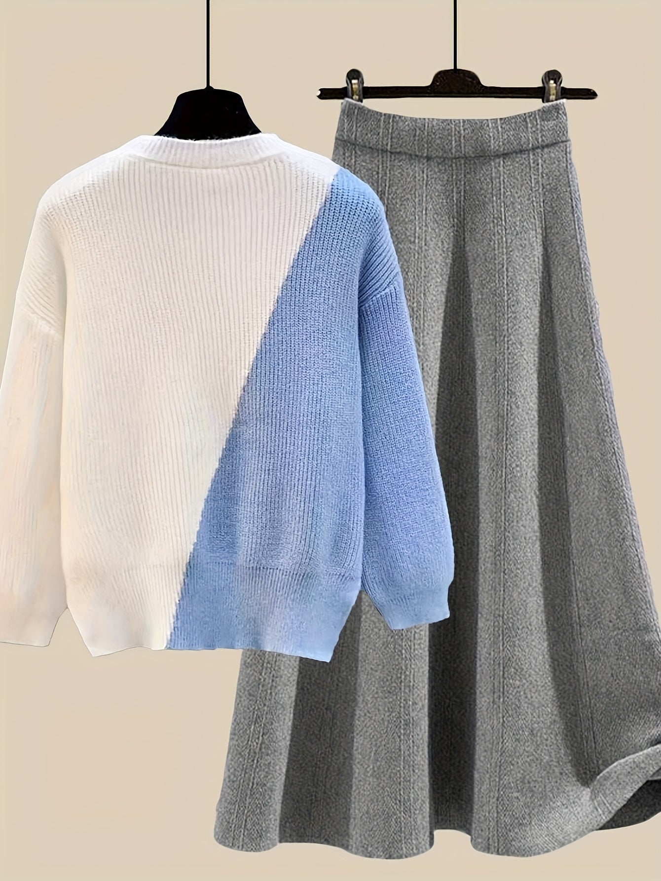 طقم نسائي من قطعتين من ملابس التريكو لفصلي الخريف والشتاء - بلوزة عصرية مع تنورة فضفاضة