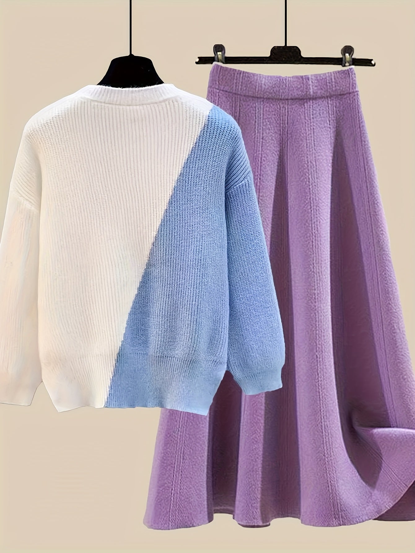 طقم نسائي من قطعتين من ملابس التريكو لفصلي الخريف والشتاء - بلوزة عصرية مع تنورة فضفاضة