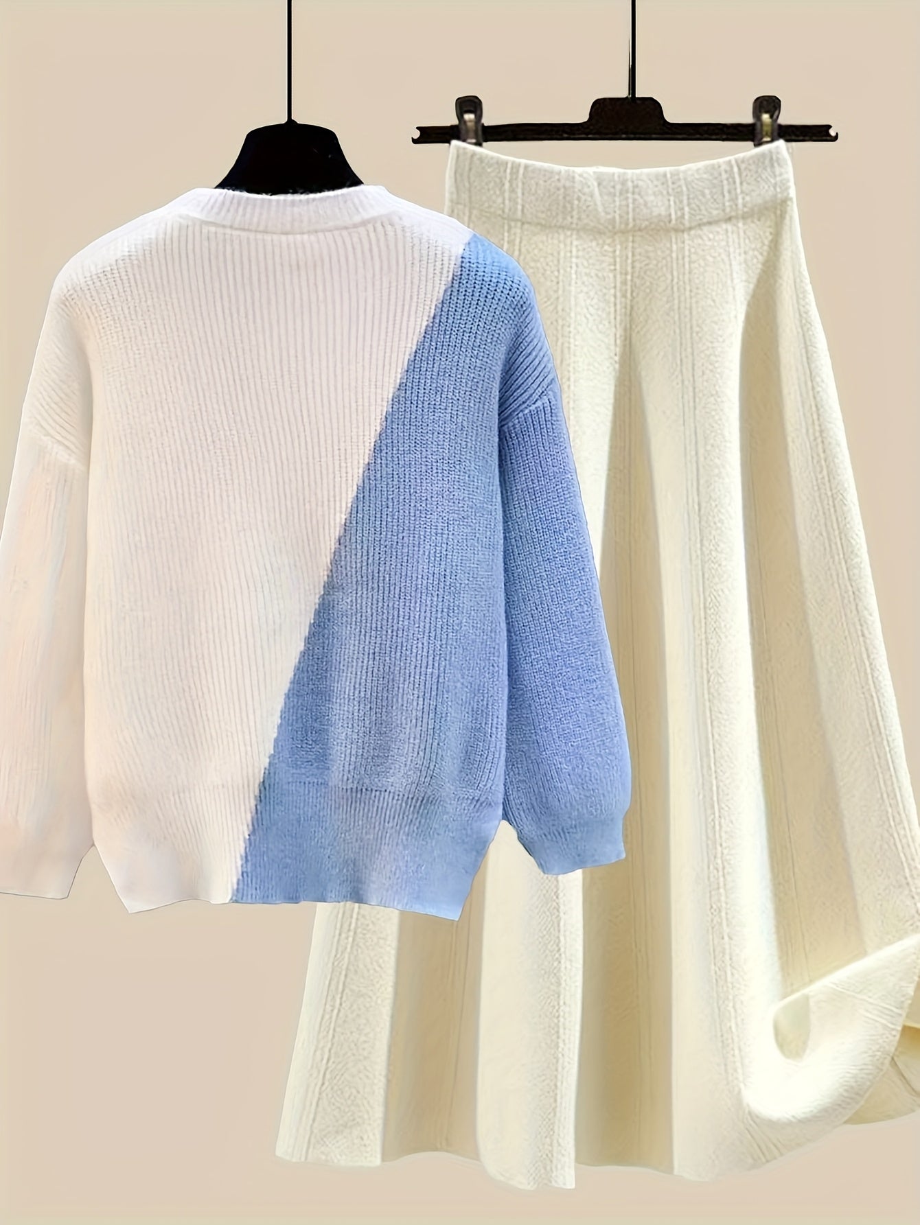 طقم نسائي من قطعتين من ملابس التريكو لفصلي الخريف والشتاء - بلوزة عصرية مع تنورة فضفاضة