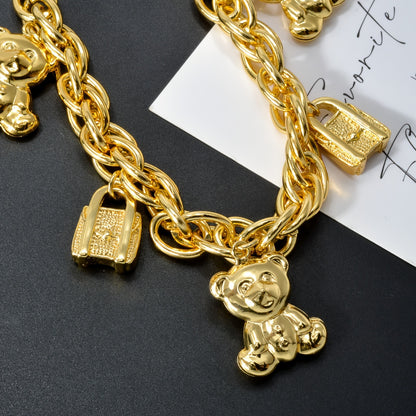 ZEADEAR Golden-Tone Bear & Handbag Charm Bracelet – Cute Copper Jewelry with Teddy Bear and Lock Pendants for Daily Wear or Special Gifts