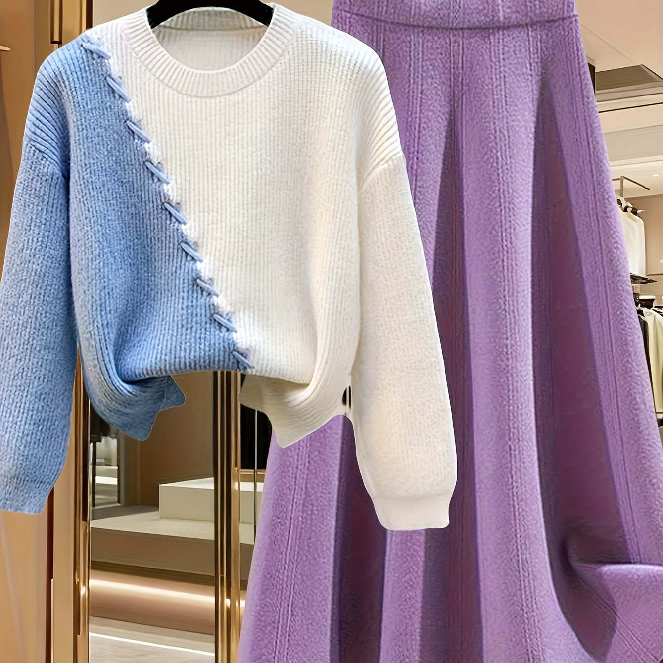 طقم نسائي من قطعتين من ملابس التريكو لفصلي الخريف والشتاء - بلوزة عصرية مع تنورة فضفاضة