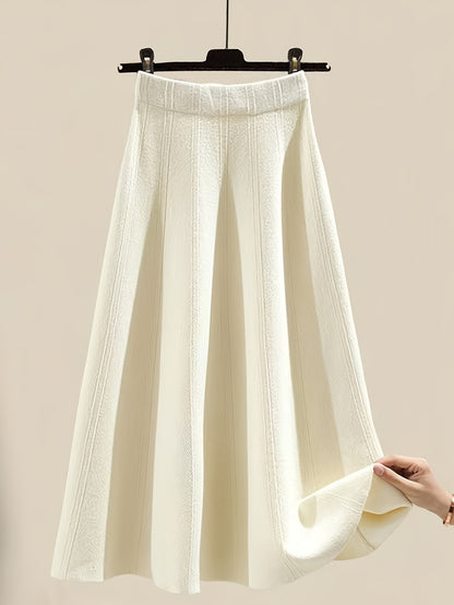 طقم نسائي من قطعتين من ملابس التريكو لفصلي الخريف والشتاء - بلوزة عصرية مع تنورة فضفاضة