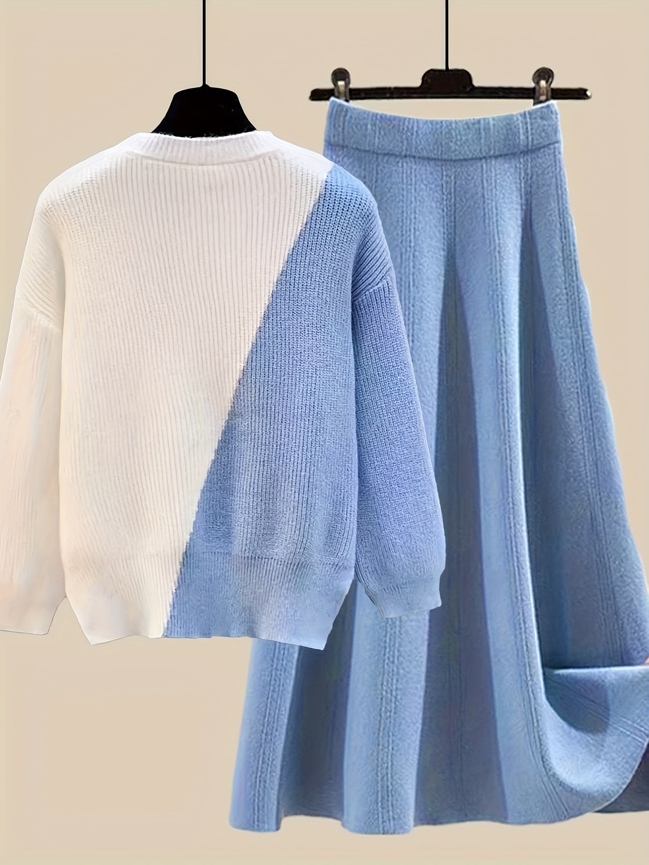 طقم نسائي من قطعتين من ملابس التريكو لفصلي الخريف والشتاء - بلوزة عصرية مع تنورة فضفاضة