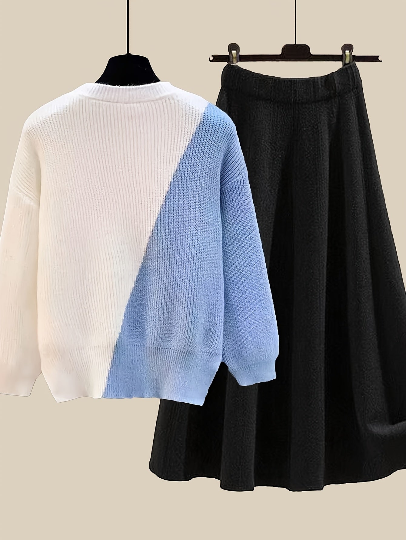 طقم نسائي من قطعتين من ملابس التريكو لفصلي الخريف والشتاء - بلوزة عصرية مع تنورة فضفاضة