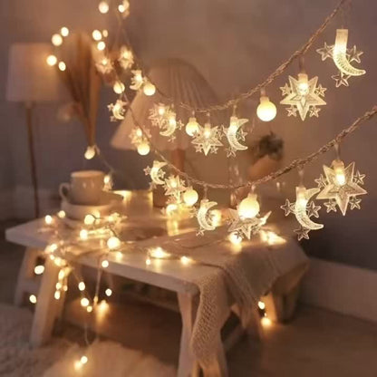 سلسلة إضاءة مكونة من 10 مصابيح LED، تتميز بنجوم وأقمار وكرات بيضاء صغيرة خاصة بشهر رمضان. تُعد سلسلة الإضاءة الرمضانية هذه مناسبة لعيد الحب، ورمضان، وعيد الفطر، وغرف النوم، والمنازل، والجدران، وحفلات أعياد الميلاد، وحفلات الزفاف.