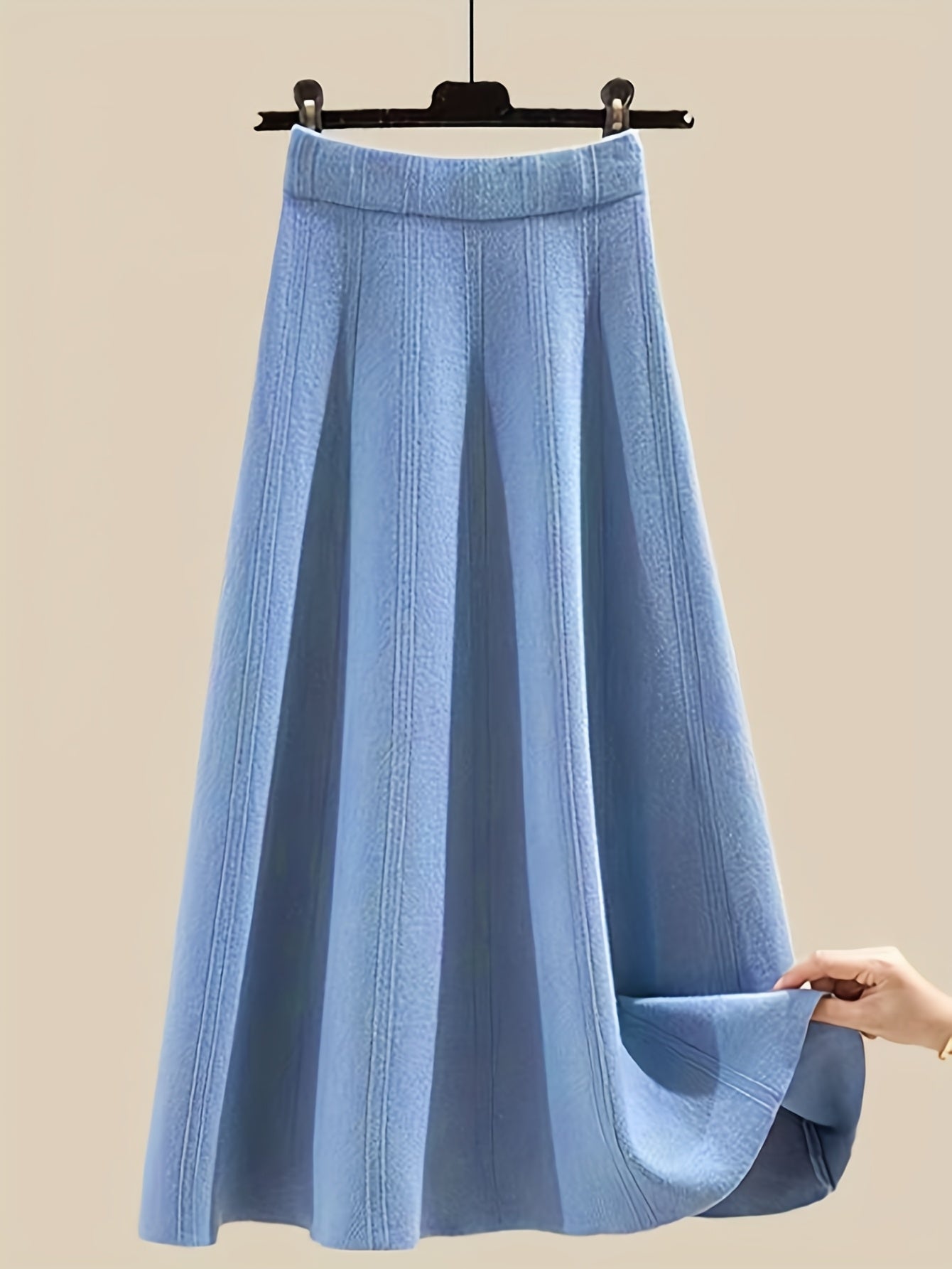 طقم نسائي من قطعتين من ملابس التريكو لفصلي الخريف والشتاء - بلوزة عصرية مع تنورة فضفاضة