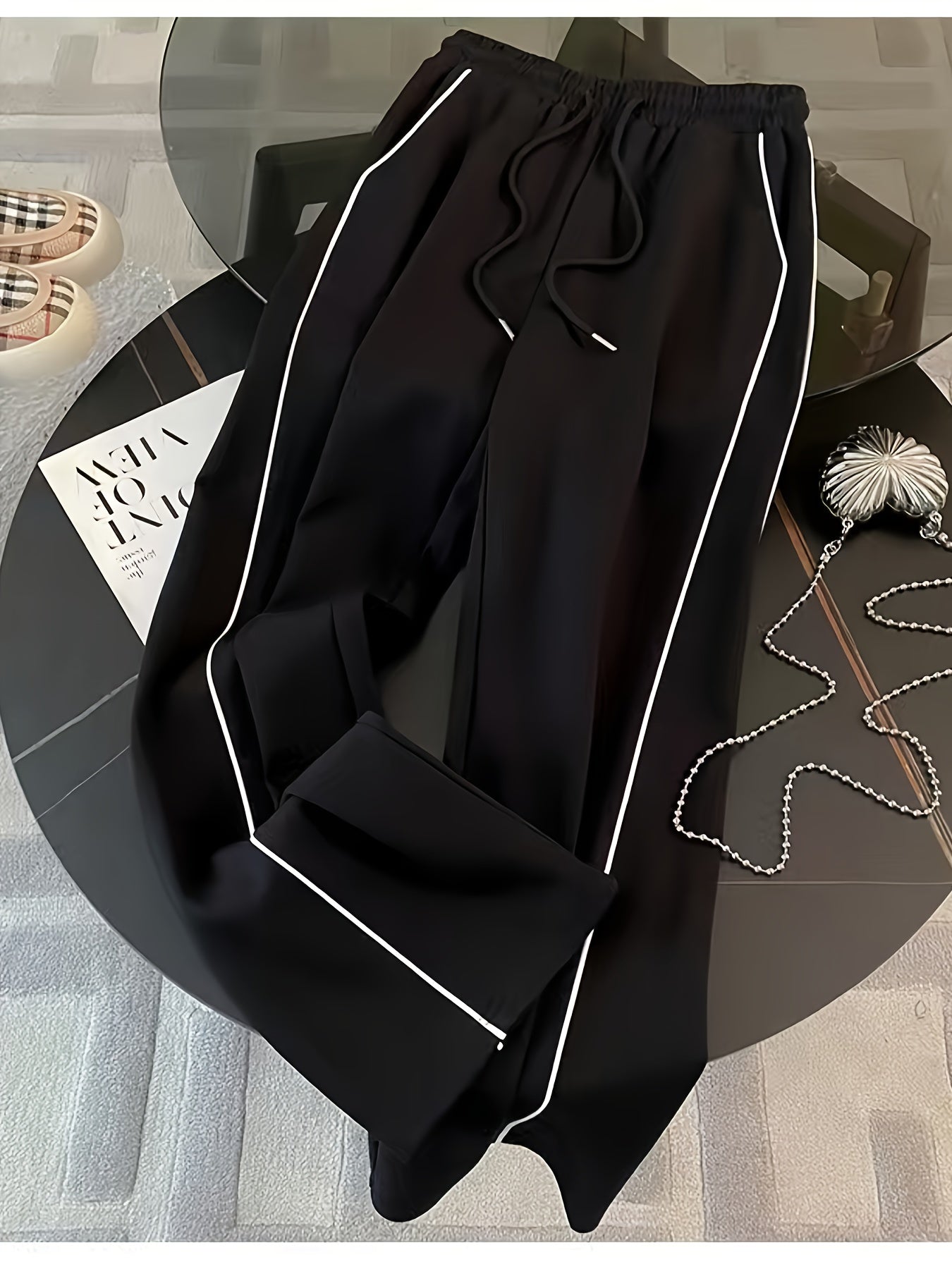 طقم نسائي من قطعتين، جاكيت بسحاب متعدد الألوان وبنطلون برباط، مناسب للربيع والخريف